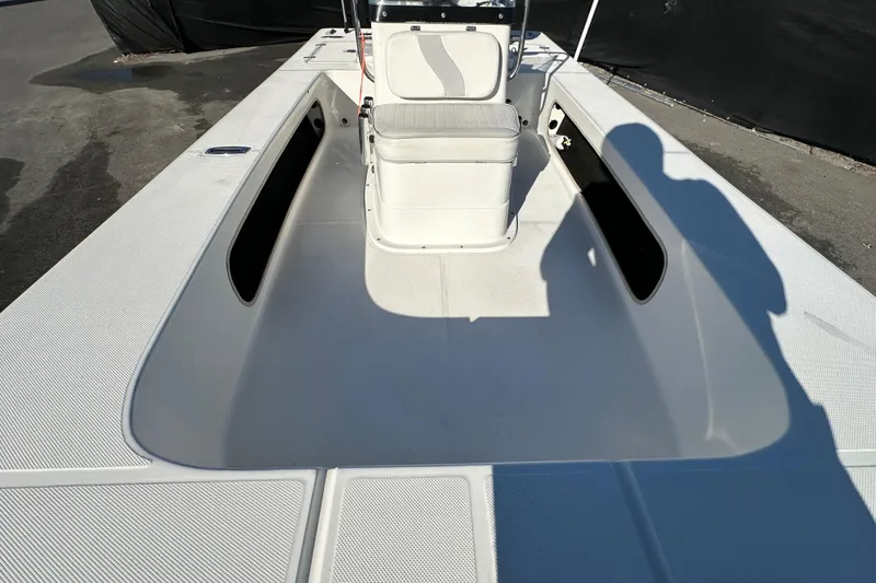 Slide: The Image of 2013 Spyder FX17 Flicker boat interior with seating and storage compartments. - 28