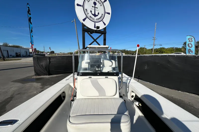 Slide: The Image of 2013 Spyder FX17 Flicker boat displayed outdoors under clear blue sky. - 29