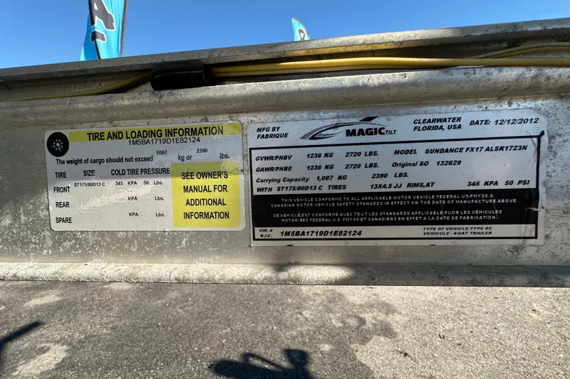 Slide: The Image of 2013 Spyder FX17 Flicker boat with Sundance branding and QA approval label. - 38