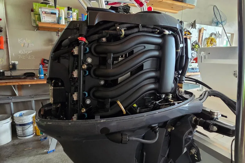 Slide: The Image of 2013 Spyder FX17 Flicker boat with Yamaha engine on a trailer, sunny day. - 7