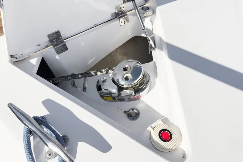 Slide: The Image of Anchor locker of 2016 Intrepid 400 Cuddy boat with winch and chain. - 17