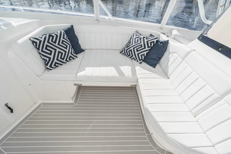 Slide: The Image of Luxurious seating area on 2016 Intrepid 400 Cuddy boat with stylish cushions. - 47