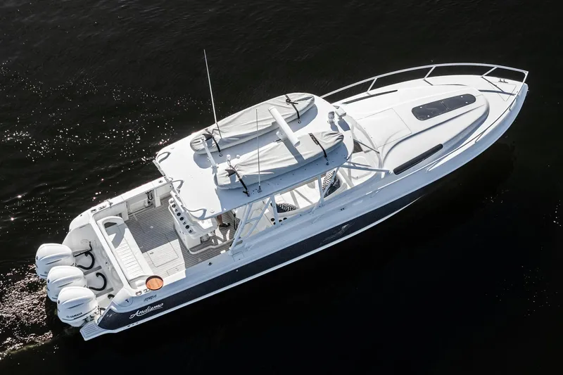 Slide: The Image of 2016 Intrepid 400 Cuddy boat on water, aerial view. - 5