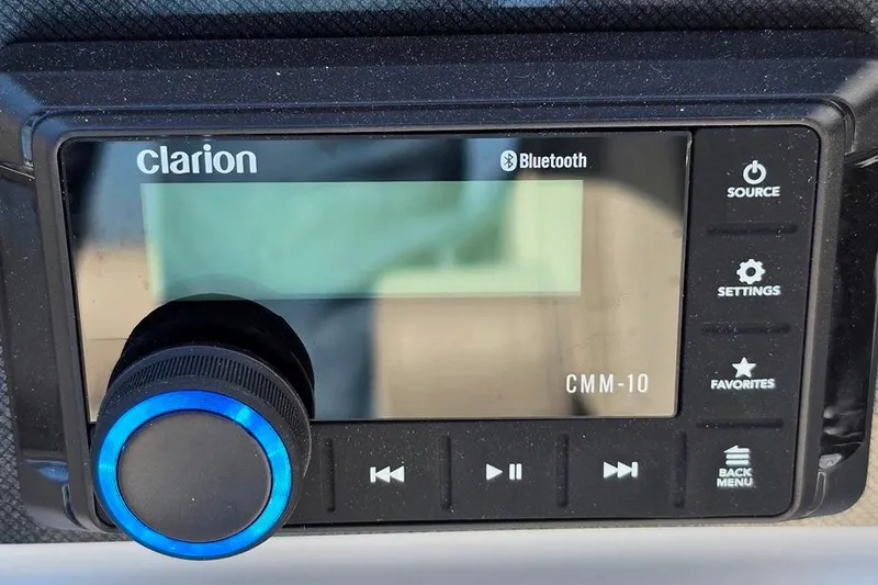 Slide: The Image of Clarion CMM-10 Bluetooth stereo system in 2026 Godfrey Experience 2086 BFX boat. - 12