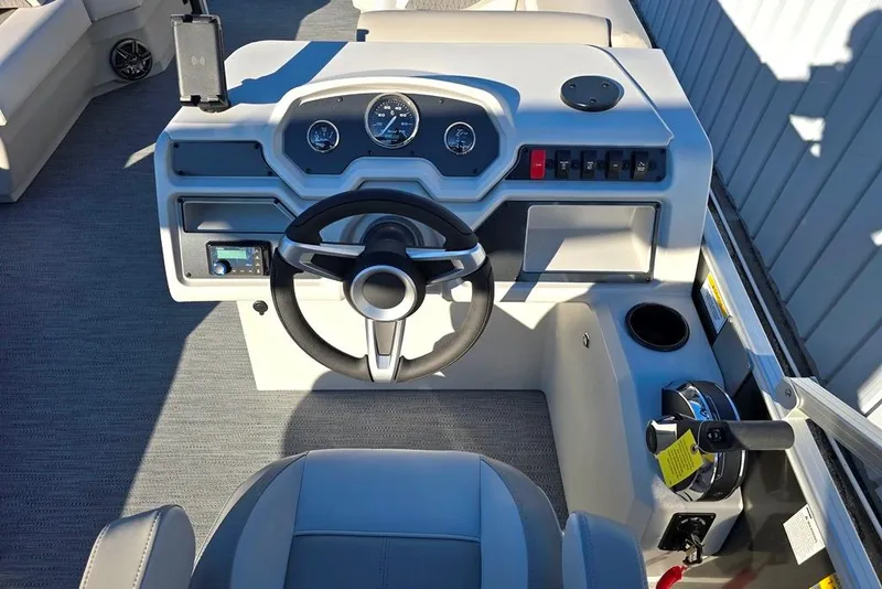 Slide: The Image of Steering console of 2026 Godfrey Experience 2086 BFX boat with modern controls and gauges. - 7