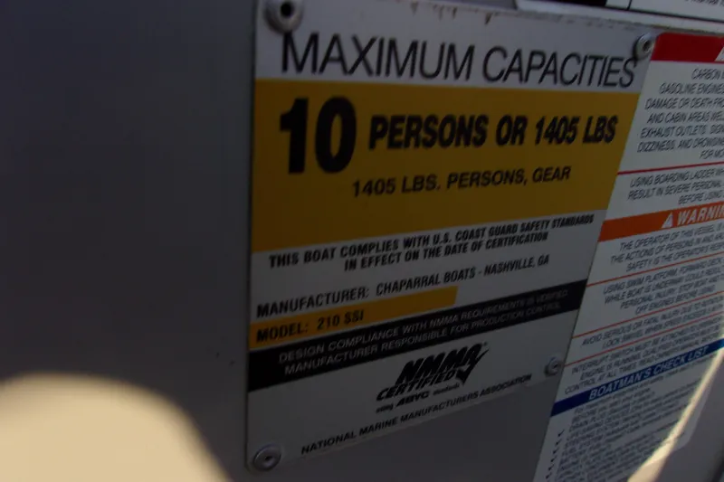 Slide: The Image of Capacity label on 2007 Chaparral 210 SSi boat, maximum 10 persons or 1405 lbs. - 15