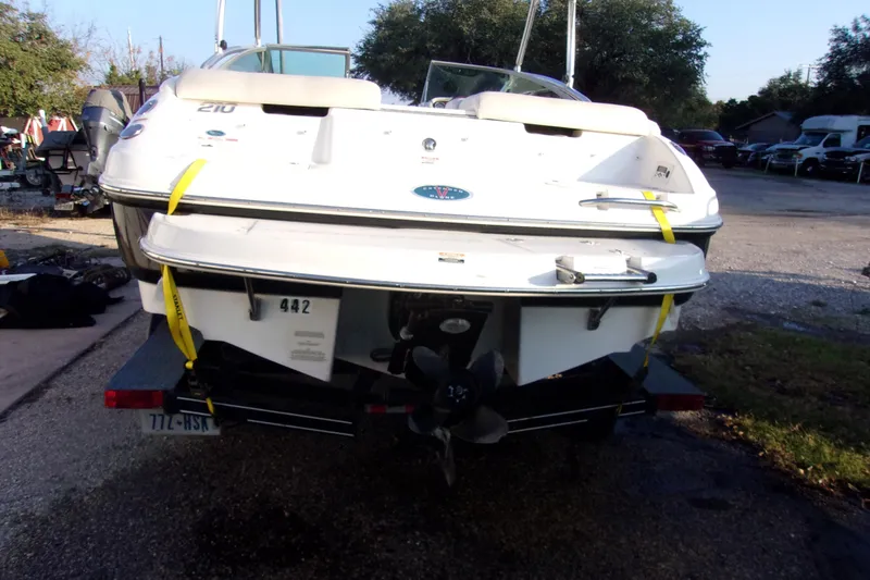 Slide: The Image of 2007 Chaparral 210 SSi boat on trailer, rear view, outdoors. - 3