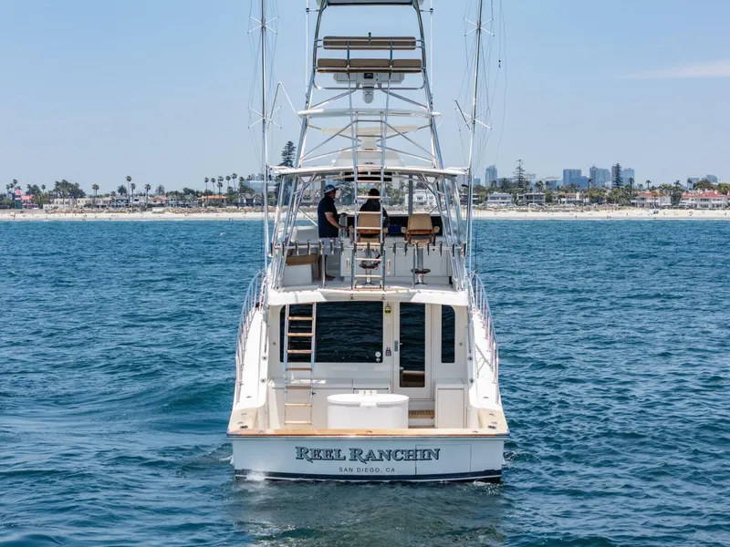 Slide: The Image of 2004 Hatteras 54 Convertible yacht on ocean near San Diego coast. - 49