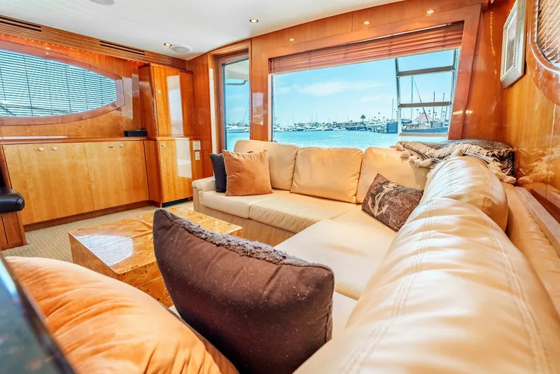 Slide: The Image of Luxurious interior of 2004 Hatteras 54 Convertible yacht with plush seating and ocean view. - 8