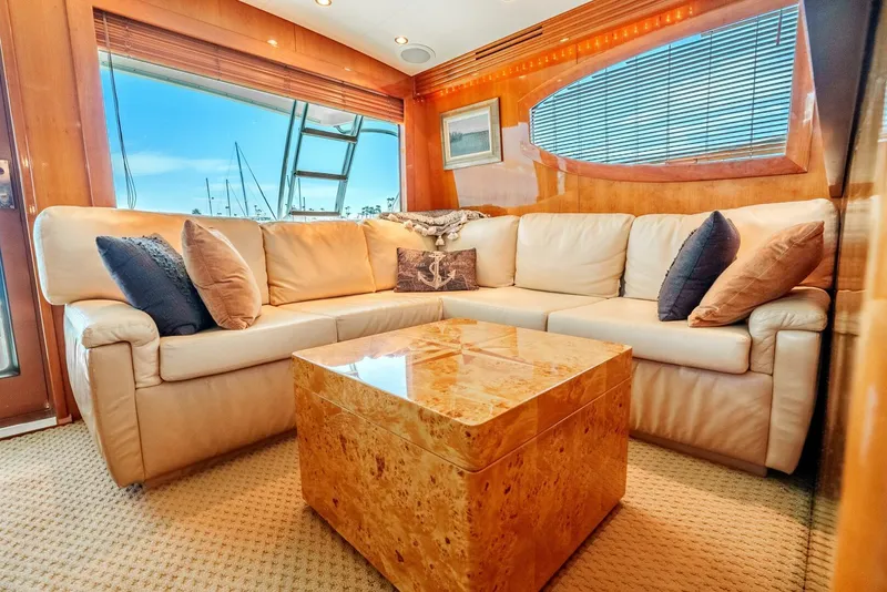 Slide: The Image of Luxurious interior of 2004 Hatteras 54 Convertible yacht with plush seating and elegant decor. - 9