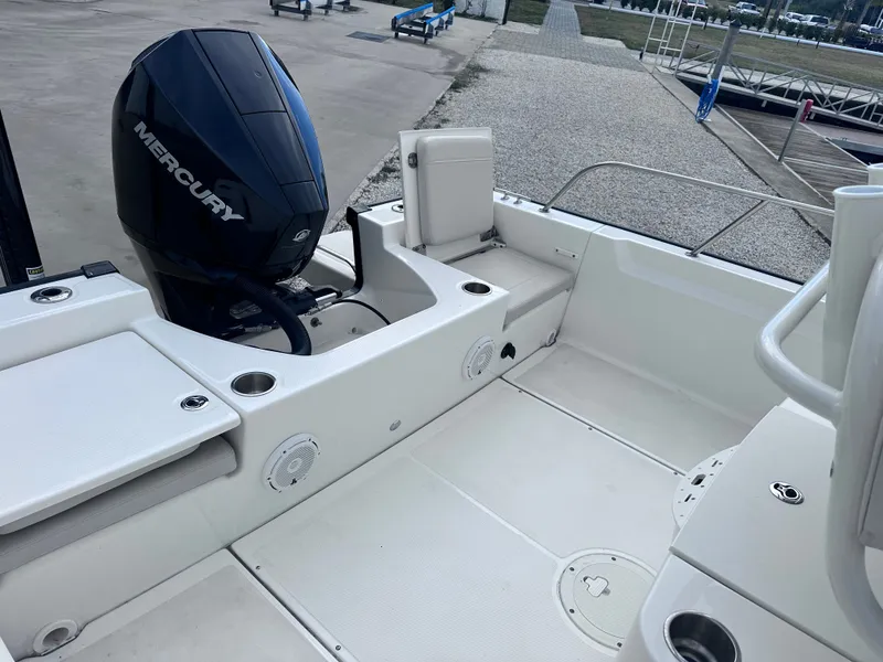 Slide: The Image of Interior of a 2023 Boston Whaler 210 Montauk with Mercury engine. - 14
