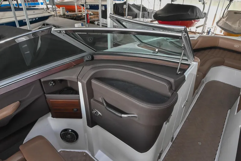 Slide: The Image of Interior of a 2015 Cobalt R7 boat, featuring sleek seating and modern design elements. - 23