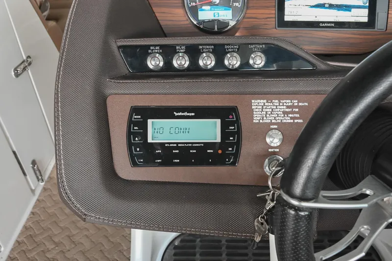 Slide: The Image of 2015 Cobalt R7 dashboard with controls, stereo system, and Garmin display. - 28