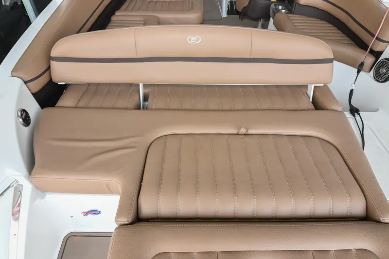 Slide: The Image of 2015 Cobalt R7 boat interior with tan leather seating and sleek design. - 7