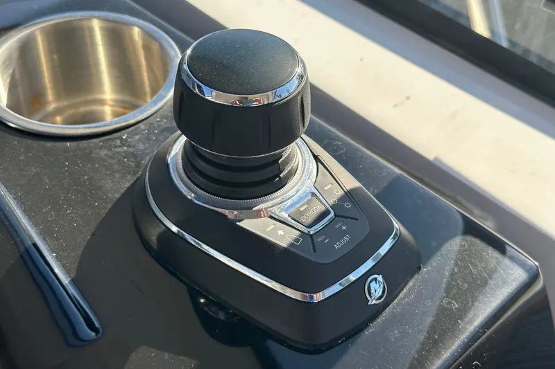Slide: The Image of Joystick control on 2025 NX Boats 370 dashboard, featuring sleek design and functionality. - 40
