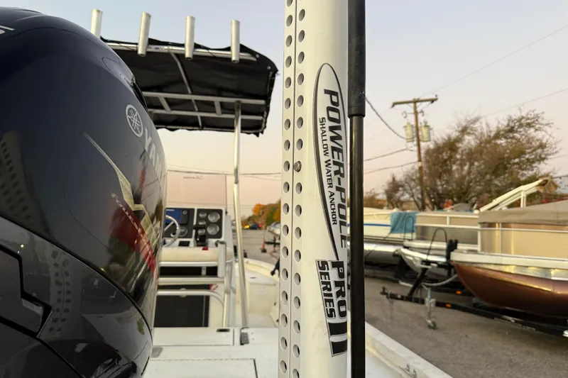 Slide: The Image of 2019 G3 Bay 22 DLX boat on trailer at sunset by the water. - 10