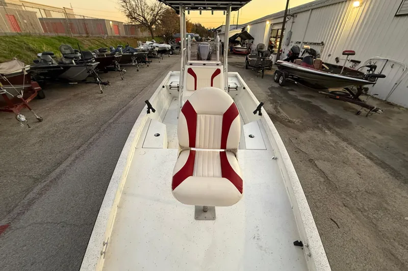 Slide: The Image of 2019 G3 Bay 22 DLX boat on trailer by the water. - 11