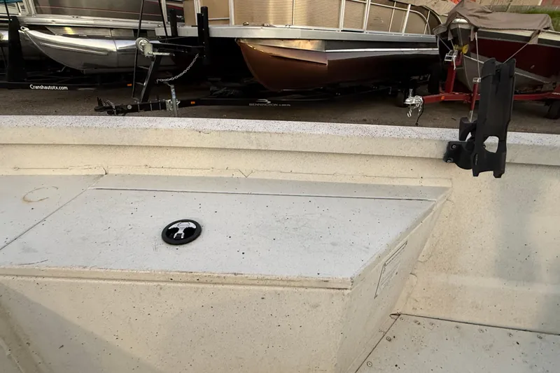 Slide: The Image of 2019 G3 Bay 22 DLX boat on trailer at sunset by the water. - 13