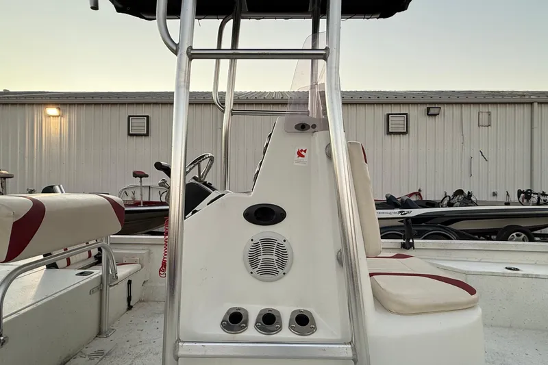 Slide: The Image of 2019 G3 Bay 22 DLX boat interior with Yamaha 175 engine, featuring seating and storage. - 26