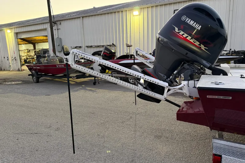 Slide: The Image of 2019 G3 Bay 22 DLX boat at sunset by the water, on a trailer. - 6