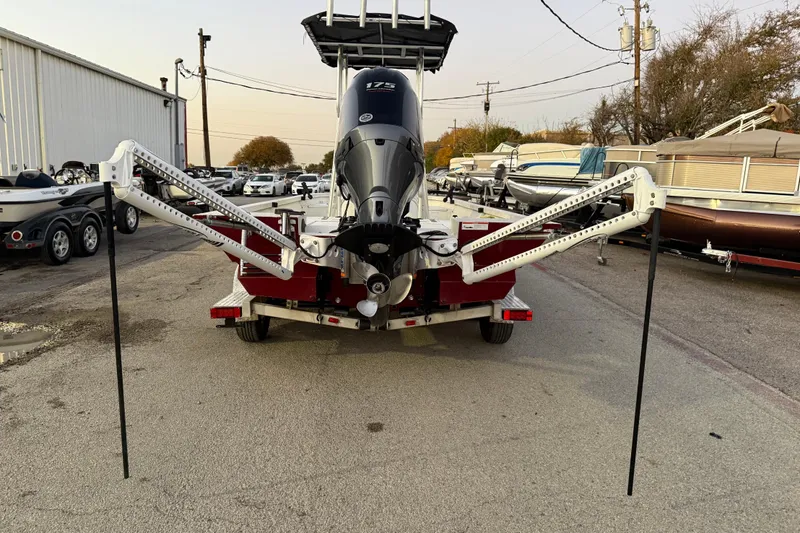 Slide: The Image of 2019 G3 Bay 22 DLX boat on trailer by waterfront at sunset. - 8