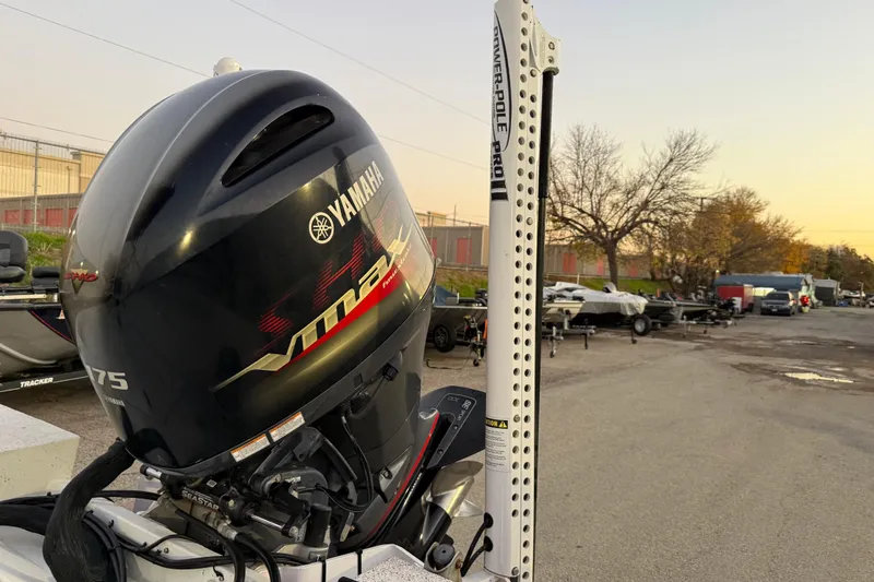 Slide: The Image of 2019 G3 Bay 22 DLX boat on trailer by waterfront at sunset. - 9