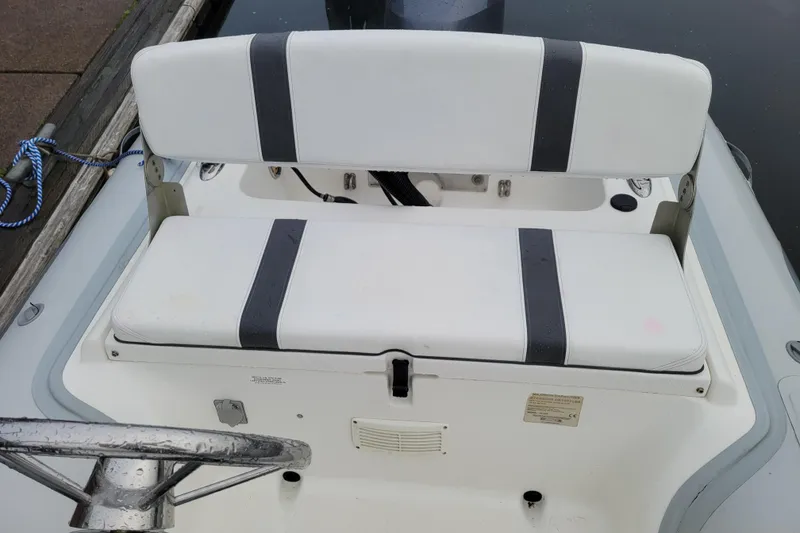 Slide: The Image of 2014 AB Inflatables Oceanus 15 VST boat seat with white and black upholstery. - 11