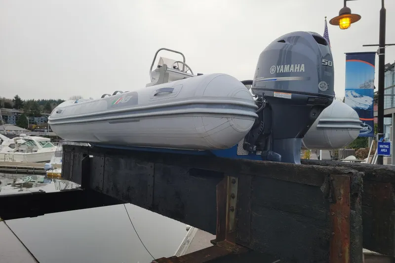 Slide: The Image of 2014 AB Inflatables Oceanus 15 VST with Yamaha engine at marina dock. - 16
