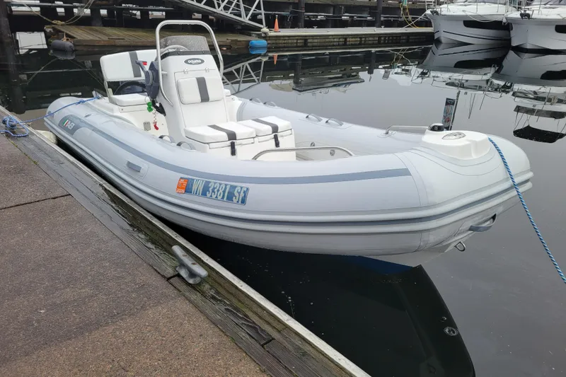 The Image of 2014 AB Inflatables Oceanus 15 VST boat docked at marina. - 2