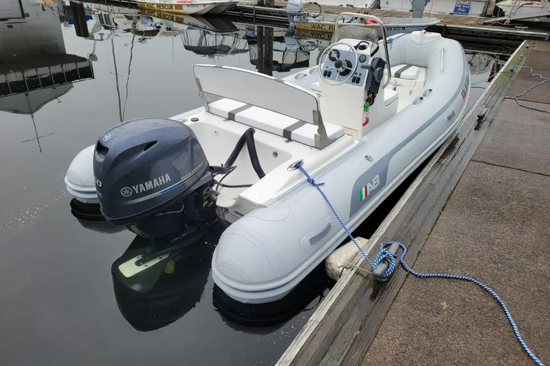 Slide: The Image of 2014 AB Inflatables Oceanus 15 VST boat with Yamaha motor docked at marina. - 4
