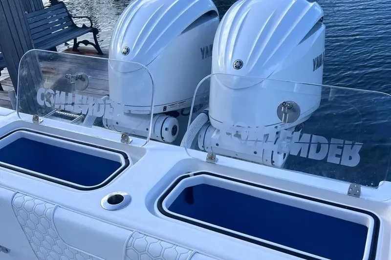 Slide: The Image of 2024 Contender 30 Tournament boat with dual Yamaha outboard engines and live wells. - 25