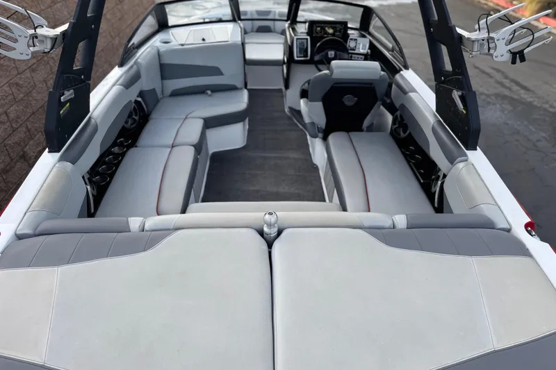Slide: The Image of 2020 Malibu Wakesetter 22 LSV interior with spacious seating and modern dashboard. - 12