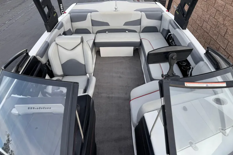Slide: The Image of 2020 Malibu Wakesetter 22 LSV interior with gray and white seating, open layout. - 21