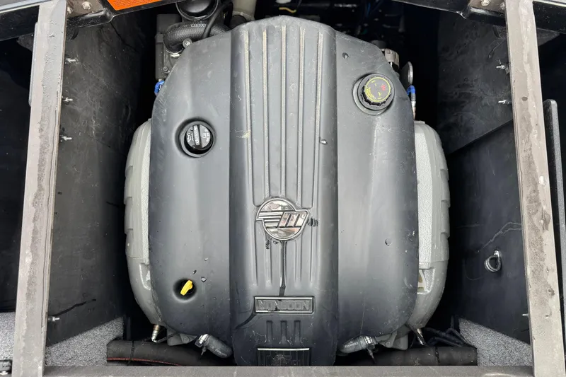 Slide: The Image of 2020 Malibu Wakesetter 22 LSV engine compartment with Monsoon engine visible. - 25