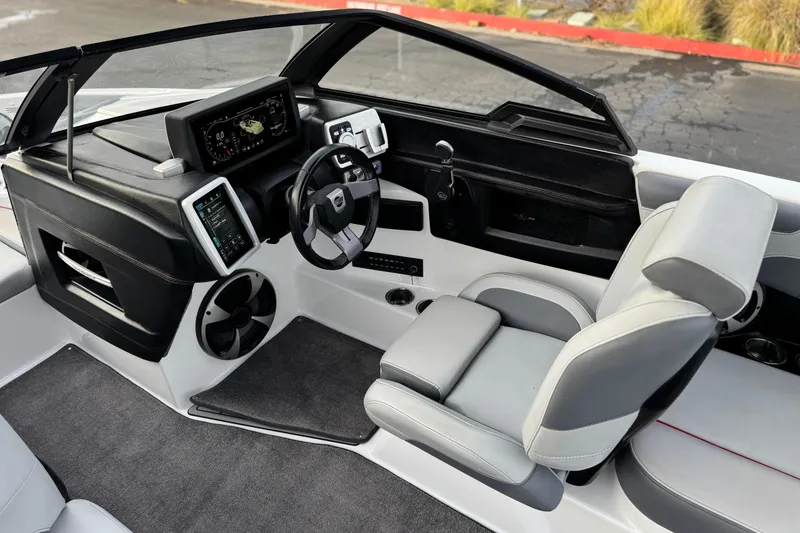 Slide: The Image of 2020 Malibu Wakesetter 22 LSV interior with modern dashboard and steering wheel. - 33