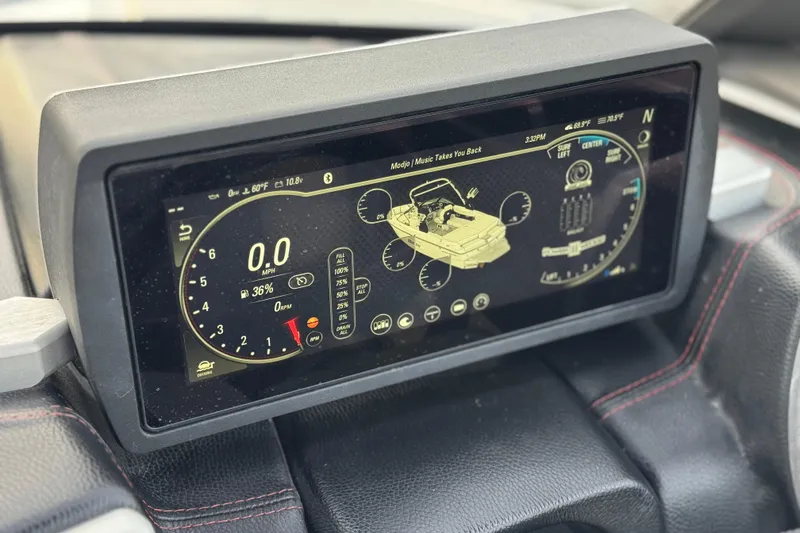Slide: The Image of Dashboard display of a 2020 Malibu Wakesetter 22 LSV boat, showing speed and system information. - 37