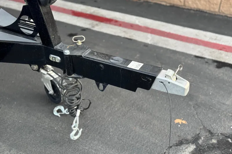 Slide: The Image of Trailer hitch of 2020 Malibu Wakesetter 22 LSV on asphalt surface. - 45