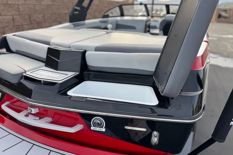 Slide: The Image of 2020 Malibu Wakesetter 22 LSV boat interior with sleek seating and storage features. - 7