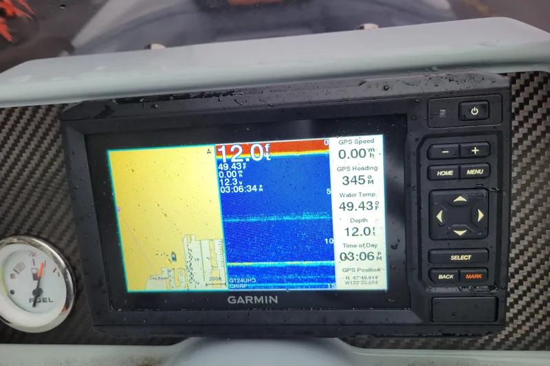 Slide: The Image of Garmin marine display on 2023 Highfield Sport 360, showing depth and GPS data. - 16