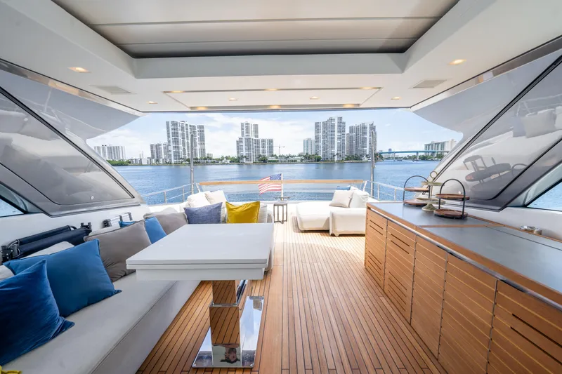 Slide: The Image of Luxurious 2021 Sanlorenzo SX76 yacht interior with waterfront city view. - 11