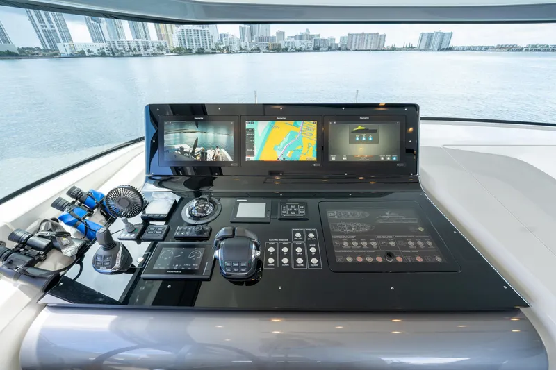 Slide: The Image of Control panel of 2021 Sanlorenzo SX76 yacht with navigation screens and controls. - 18