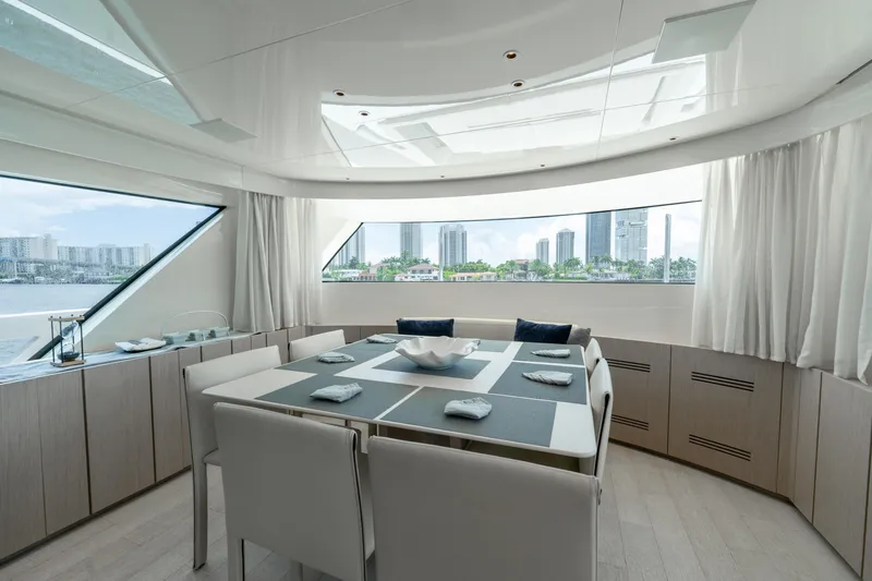 Slide: The Image of Luxurious dining area on 2021 Sanlorenzo SX76 yacht with cityscape view. - 27