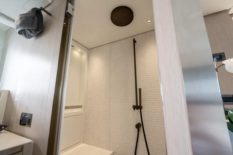 Slide: The Image of Modern shower area in 2021 Sanlorenzo SX76 yacht, featuring sleek design and fixtures. - 35