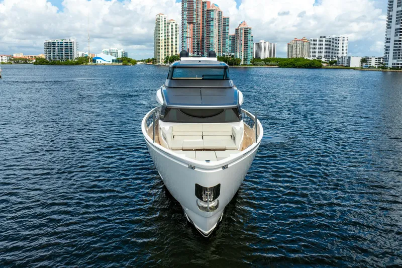 Slide: The Image of Sanlorenzo SX76 2021 yacht on water with city skyline background. - 4