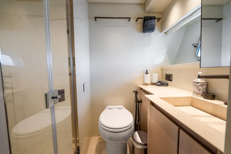 Slide: The Image of Bathroom interior of 2021 Sanlorenzo SX76 yacht, featuring modern fixtures and elegant design. - 42