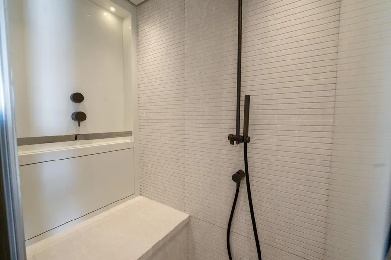 Slide: The Image of Modern bathroom shower in 2021 Sanlorenzo SX76 yacht, featuring sleek fixtures and minimalist design. - 45