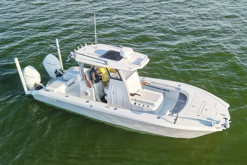 Slide: The Image of 2024 Costa Custom Boats 264 HC on water, featuring dual Mercury engines. - 12