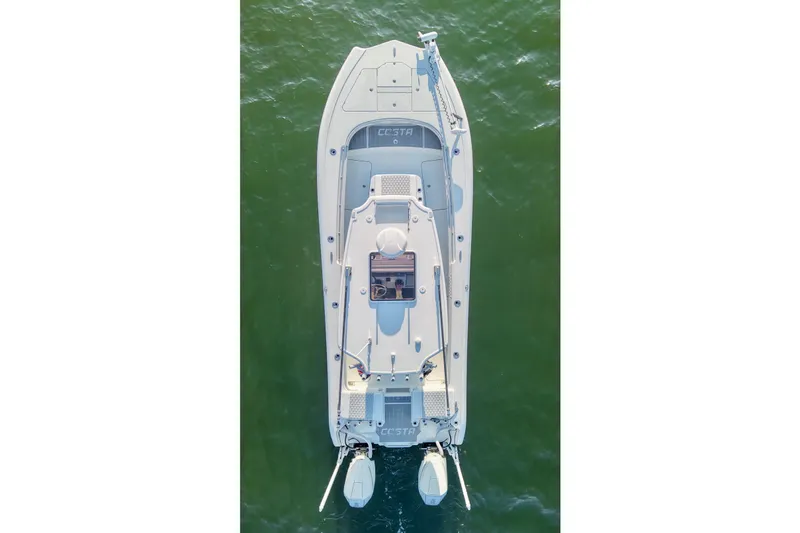 Slide: The Image of Overhead view of 2024 Costa Custom Boats 264 HC on water. - 13