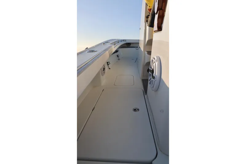 Slide: The Image of 2024 Costa Custom Boats 264 HC deck view with sleek design and modern features. - 26