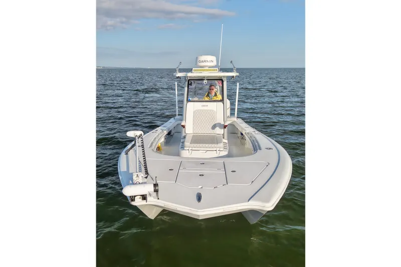 Slide: The Image of 2024 Costa Custom Boats 264 HC on open water, showcasing sleek design and advanced features. - 8